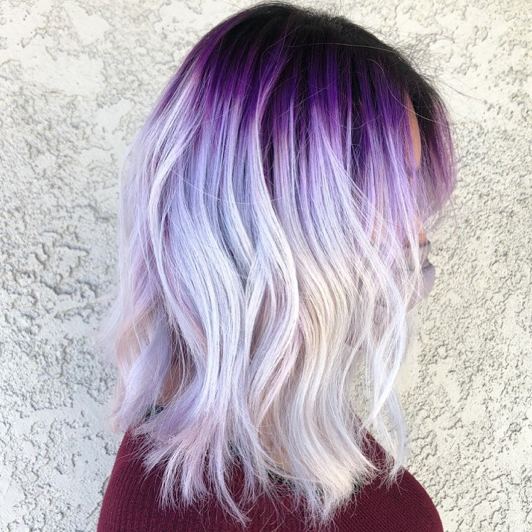 Shoulder length hair with a purple root blending into lavender and white blonde at Lumina Extensions & Beauty Bar, Cary NC